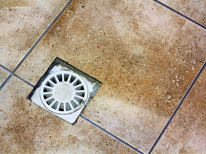water-drain-vent-kitchen-bathroom-basement-ceramic-tiled-old-vintage-floor